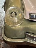 Close-up of headlight detail on Lucky Sports Car toy