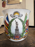 1918 WWI commemorative mug showing Statue of Liberty and Allied flags