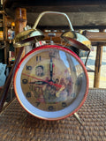 Vintage Chinese Mao Zedong propaganda alarm clock with twin brass bells, front view