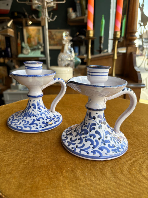 Pair of vintage Italian ceramic blue and white chamberstick candle holders with handles