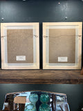 Reverse of framed engravings showing hanging wire