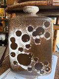 Strehla Keramik vase displayed against wooden furniture backdrop