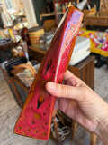 West German Fat Lava vase held in hand, showing narrow side panel with glaze texture.