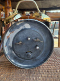 Reverse view of Mao Zedong alarm clock showing winding mechanism and adjustment dials