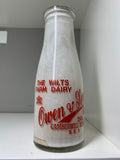 Old shop display milk bottle