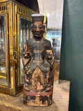 Front view of antique Chinese wood official figure holding red tablet