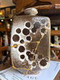 Strehla Keramik vase with brown and cream crater glaze, front view