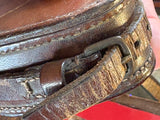 Close-up of hinge and stitching on leather case