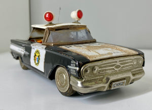 Mid century Ichiko Chevrolet Impala toy police car