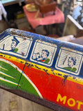 Close-up detail of passenger window illustrations on GTP Motorways tinplate coach showing uniformed conductor, man reading newspaper and woman with curled hair in individual window panels​​​​​​​​​​​​​​​​