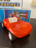 Vintage red Tonka Dune Buggy toy car with white seats and black wheels.
