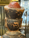 	Back of head and red-finial Qing hat on antique Chinese wood figure