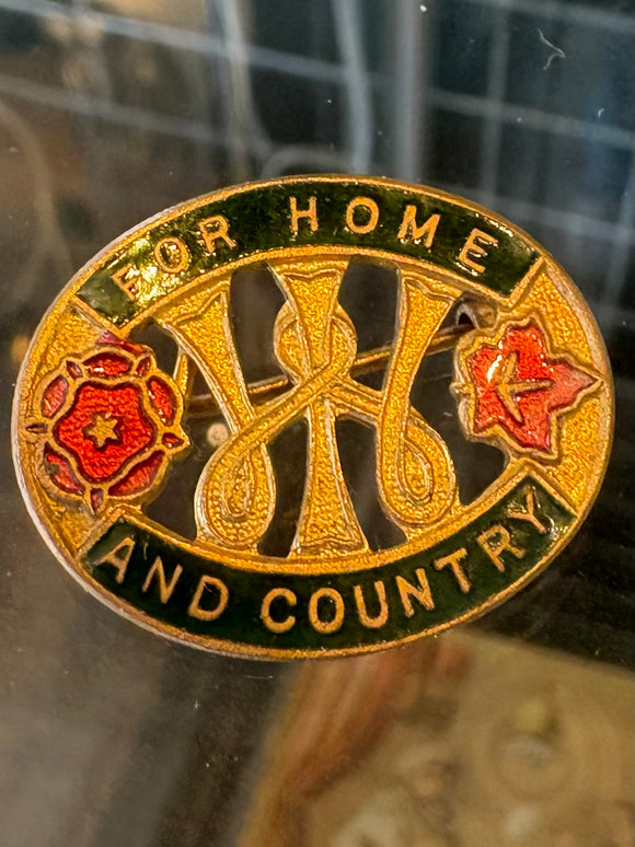 Oval gilt and enamel WW2 WI badge with 