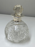 Cut glass scent bottle with silver collar