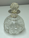 Cut glass scent bottle with silver collar