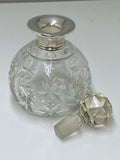 Cut glass scent bottle with silver collar