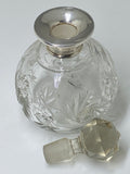 Cut glass scent bottle with silver collar