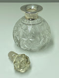 Cut glass scent bottle with silver collar