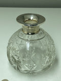 Cut glass scent bottle with silver collar