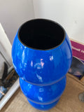 Large resin vase in vibrant blue