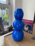 Large resin vase in vibrant blue