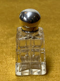 Small Victorian quality pressed glass scent bottle with sterling silver top.