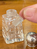 Small Victorian quality pressed glass scent bottle with sterling silver top.