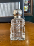 Small Victorian quality pressed glass scent bottle with sterling silver top.