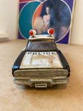 Mid century Ichiko Chevrolet Impala toy police car